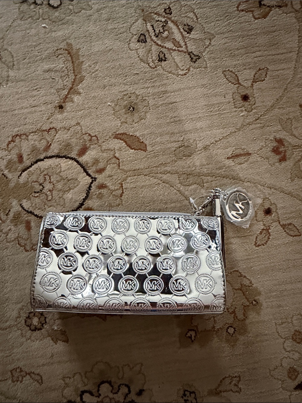 Michael Kors Silver Embossed MK Logo Wristlet